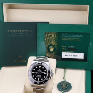 Black diver watch with no date on wrist