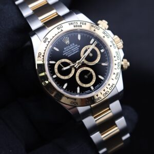 Close-up of black dial vintage chronograph