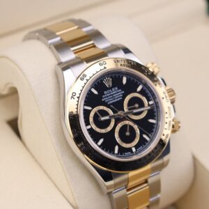 Side angle of two-tone chronograph wristwatch