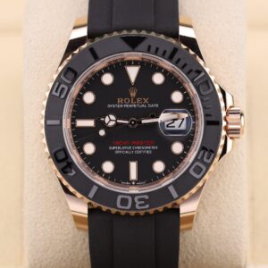 Rose gold sports watch on black strap