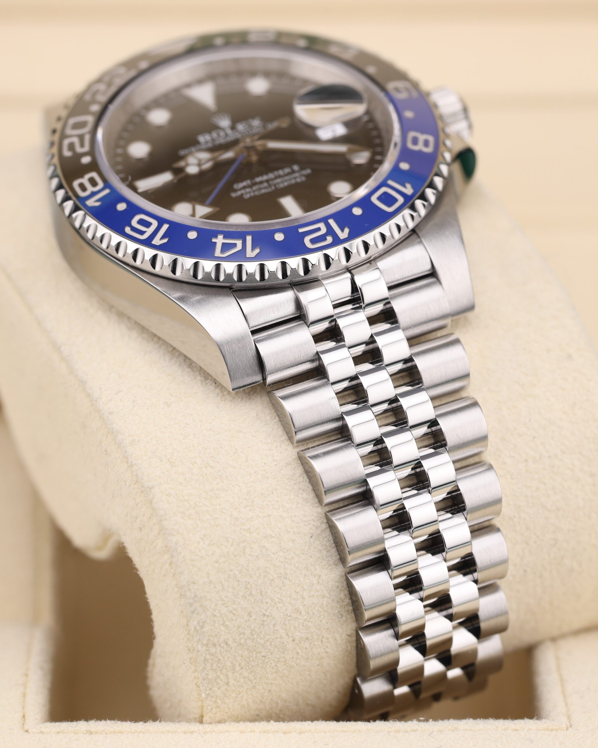 Luxury wristwatch with blue and black bezel