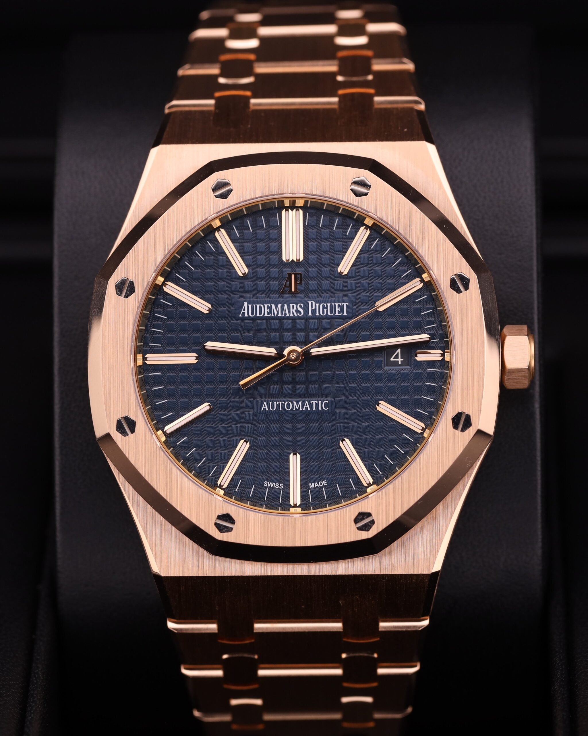 Blue dial luxury wristwatch with rose gold case