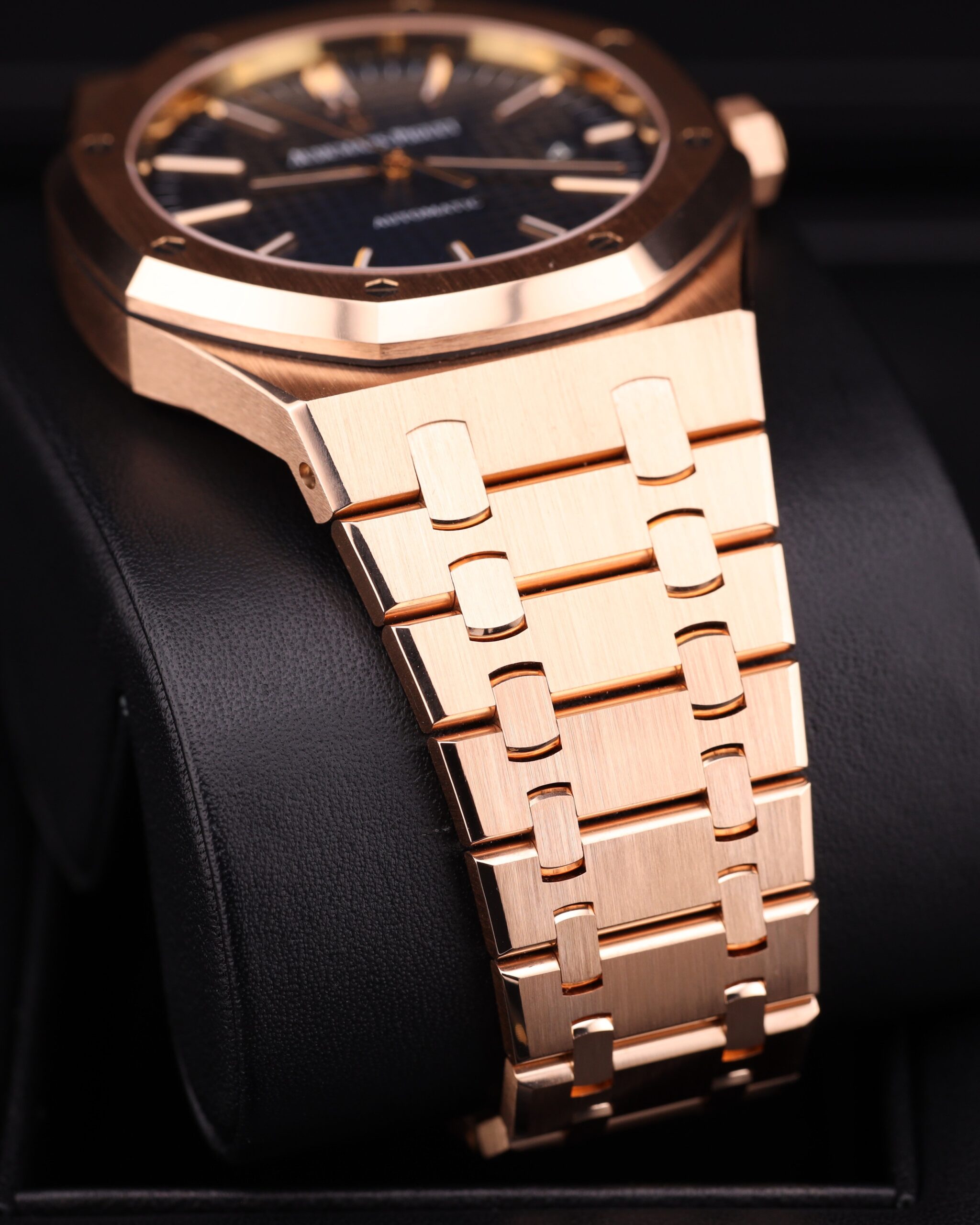 Luxury watch with blue dial and rose gold case