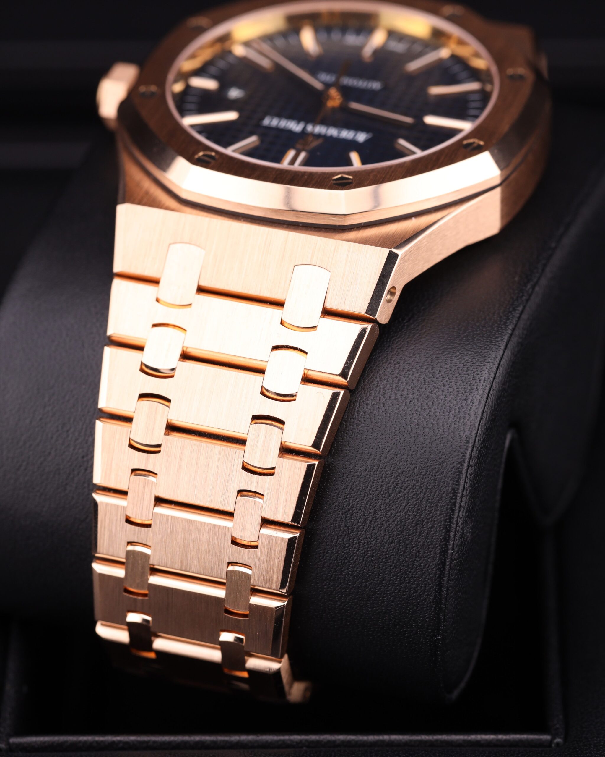 Blue dial watch with rose gold bezel and bracelet