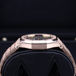 Side profile of rose gold watch with blue face