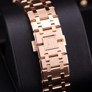 Close-up of blue dial luxury watch with rose gold