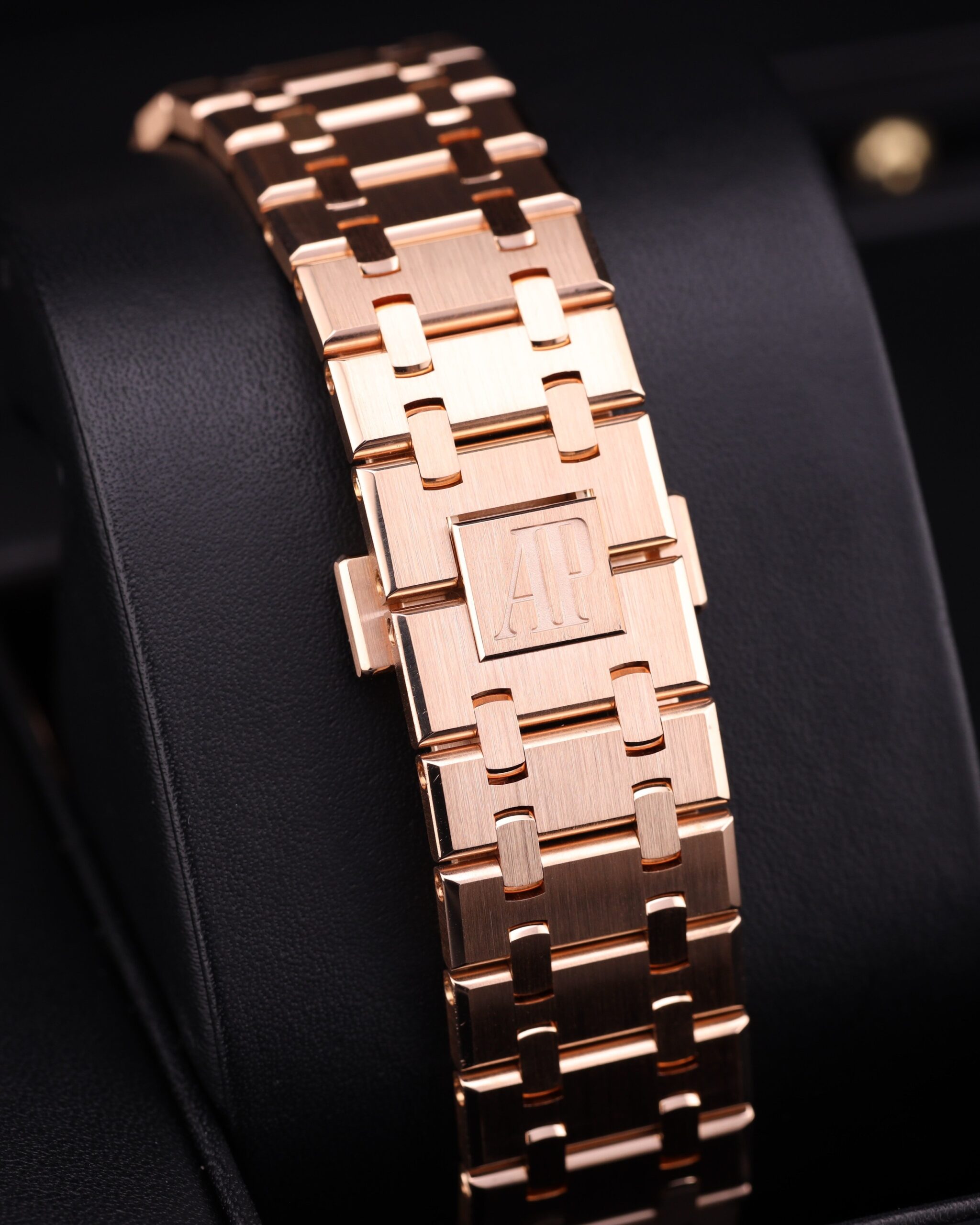 Close-up of blue dial luxury watch with rose gold