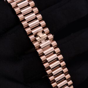 Luxury watch with pink bezel and diamonds