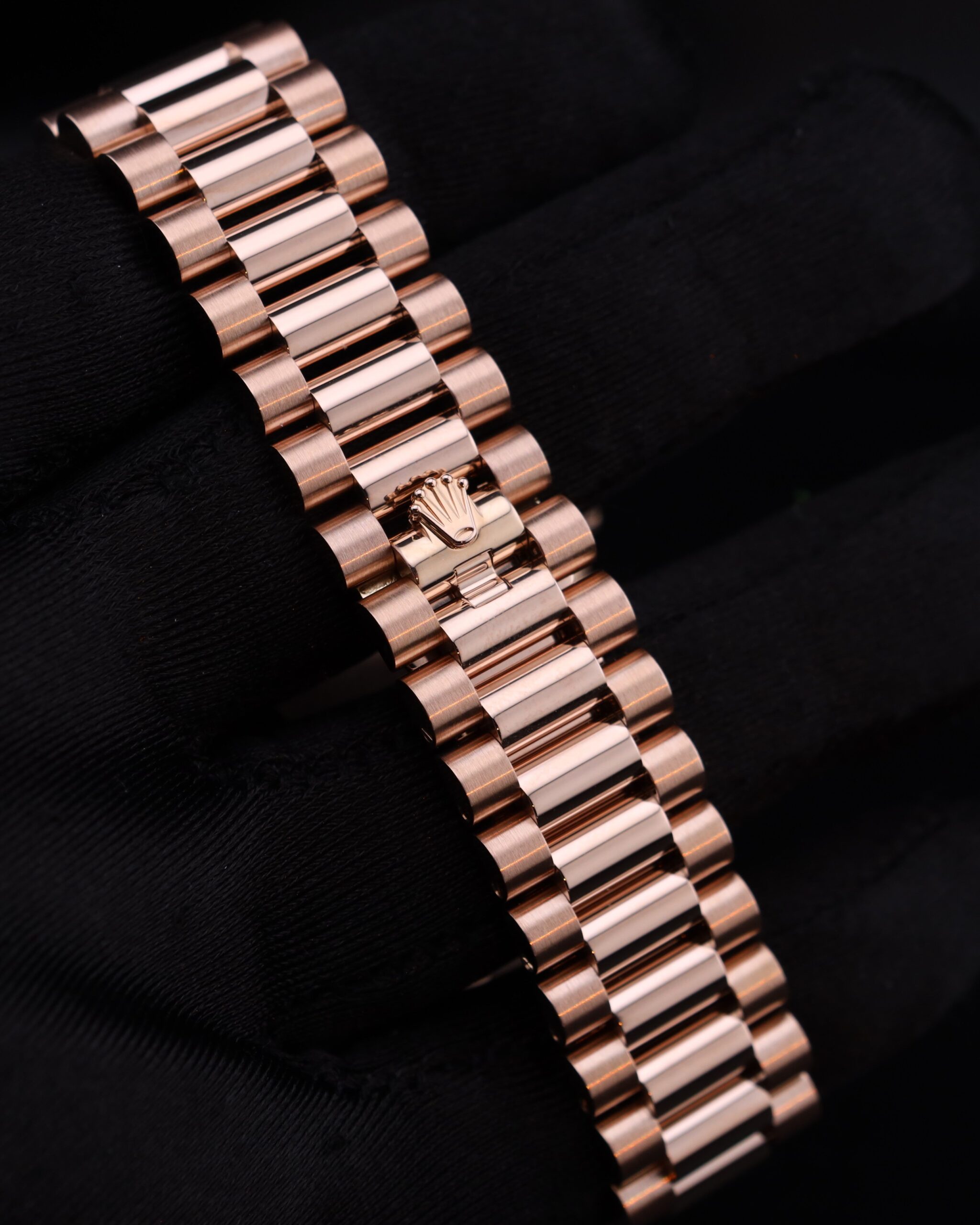 Luxury watch with pink bezel and diamonds