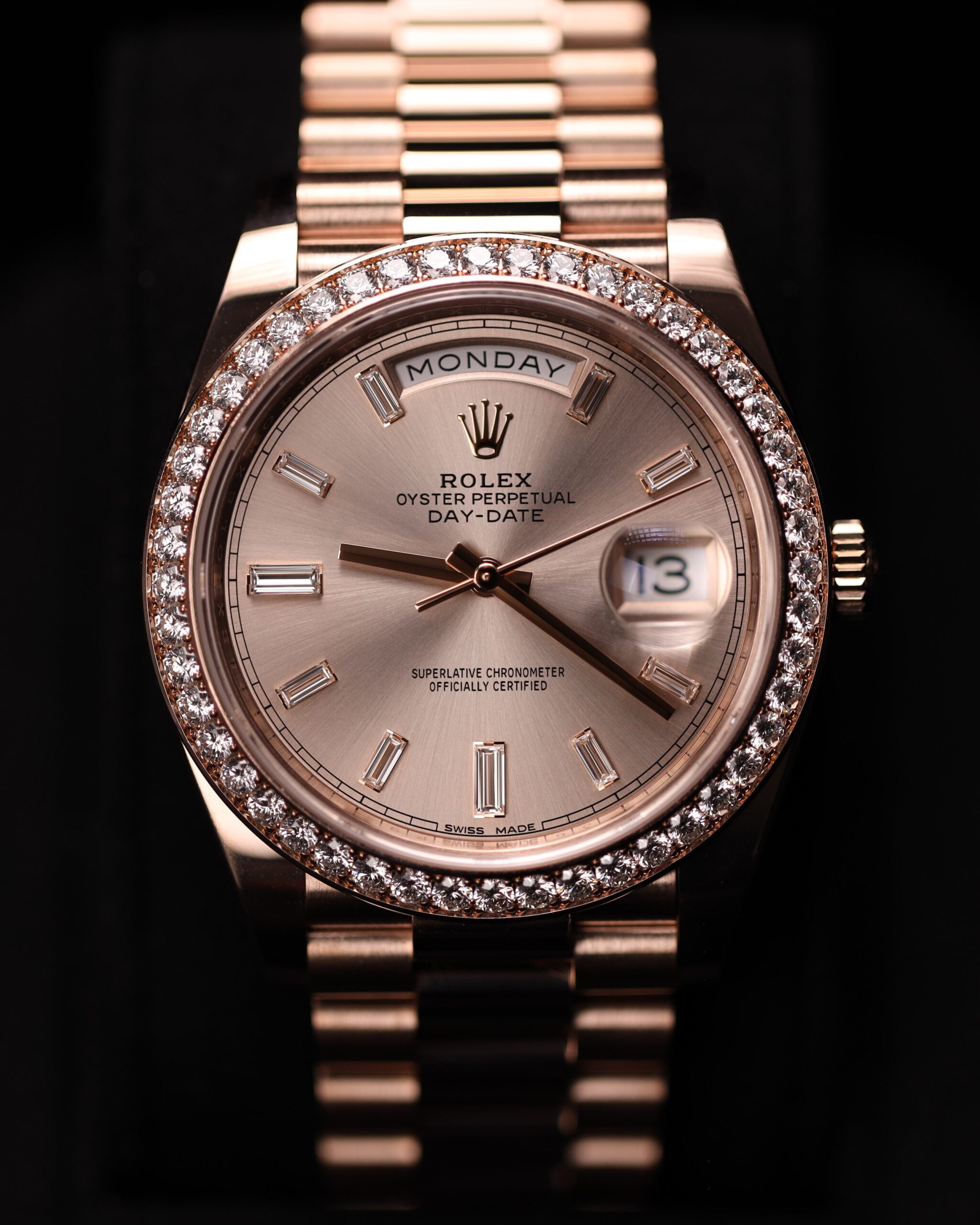 Side profile of pink bezel diamond watch