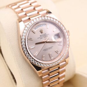 Close-up of pink bezel luxury watch dial