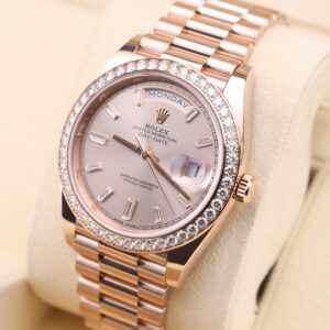 Luxury wristwatch with pink bezel and diamonds