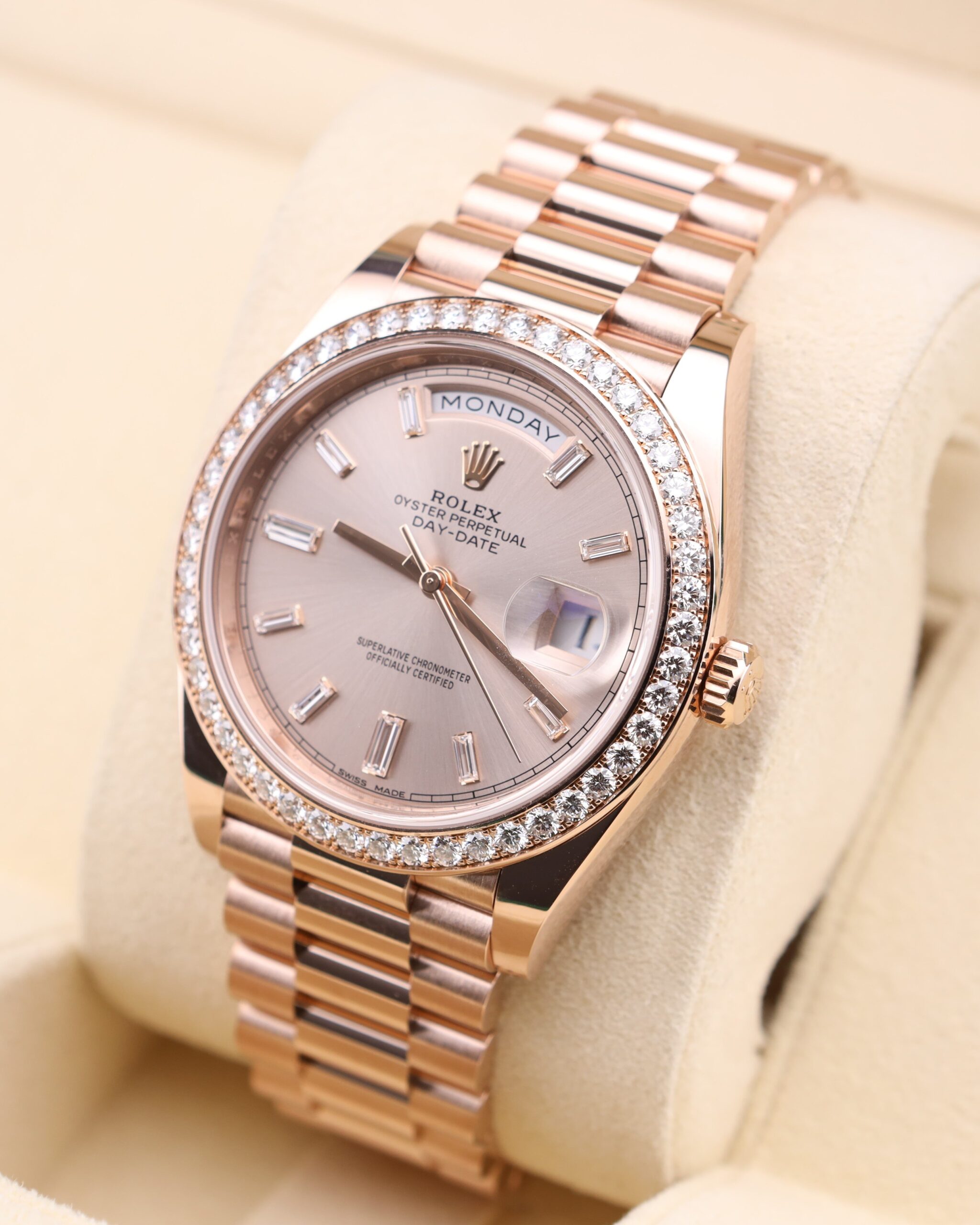 Luxury wristwatch with pink bezel and diamonds