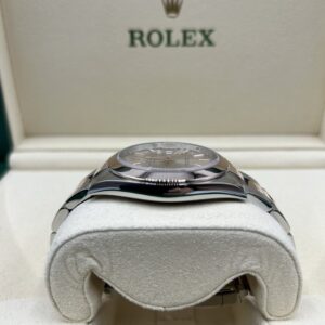 Discontinued chronograph wristwatch with patina dial