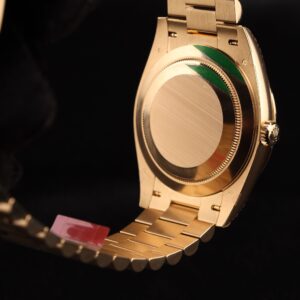 Retro wristwatch with patina dial and leather band