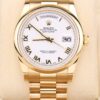 Yellow gold luxury wristwatch with white dial