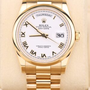 Yellow gold luxury wristwatch with white dial