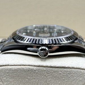 Blue dial luxury wristwatch with diamond markers
