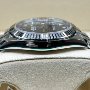 Luxury watch with blue dial and diamond indices