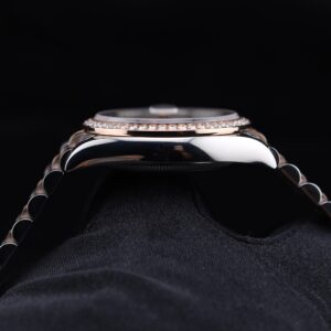 Side profile of luxury wristwatch with diamond markers