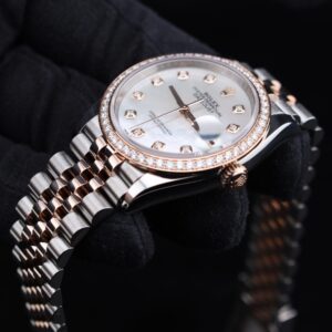 Close-up of mother-of-pearl dial watch