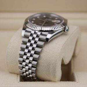 Luxury watch with black dial and diamond hour markers