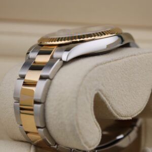 Side profile of diamond champagne dial wristwatch