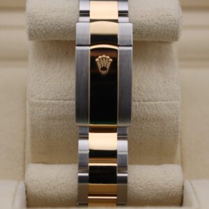 Close-up of diamond champagne dial watch face