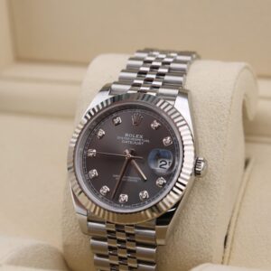 Side profile of luxury watch with diamond dial
