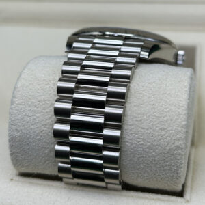 Luxury watch crown and bezel close-up