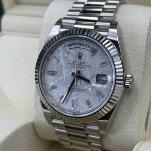 Luxury watch with meteorite dial and baguette markers