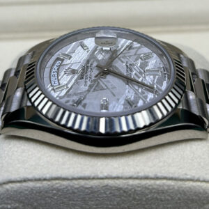 Luxury wristwatch displaying baguette hour markers