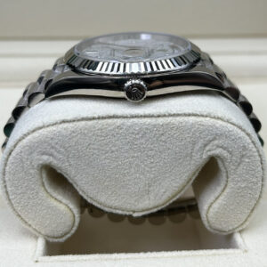 Side angle of luxury wristwatch with meteorite dial