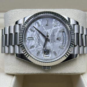 Luxury watch with meteorite dial and baguette markers
