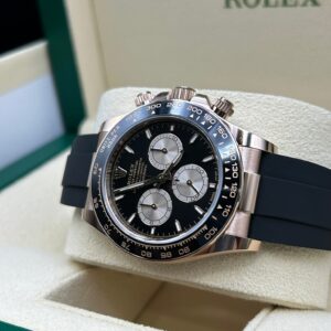 Rose gold chronograph watch with black dial strap