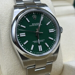 Green dial wristwatch angled view