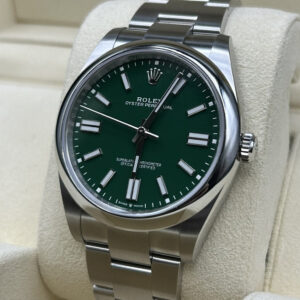 Green dial watch with polished bezel