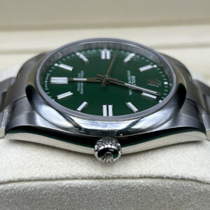 Side view of green dial wristwatch