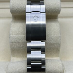 Side profile of green dial luxury wristwatch