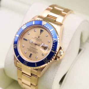 Close-up of Submariner dial with gold accents
