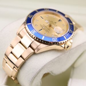 Side profile of yellow gold Submariner watch