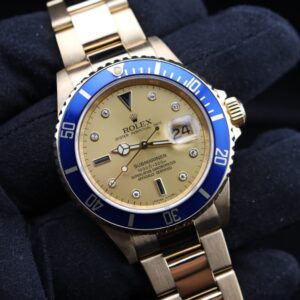 Close-up of Rolex Submariner champagne dial
