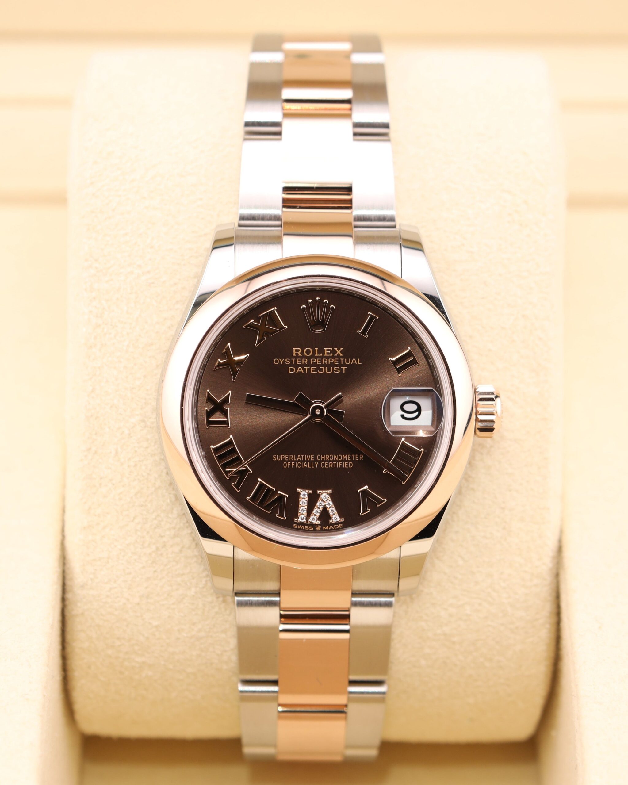 Luxury watch with chocolate dial and diamond markers