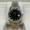 Luxury wristwatch with black diamond dial