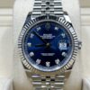 Blue dial watch with diamond markers on jubilee bracelet