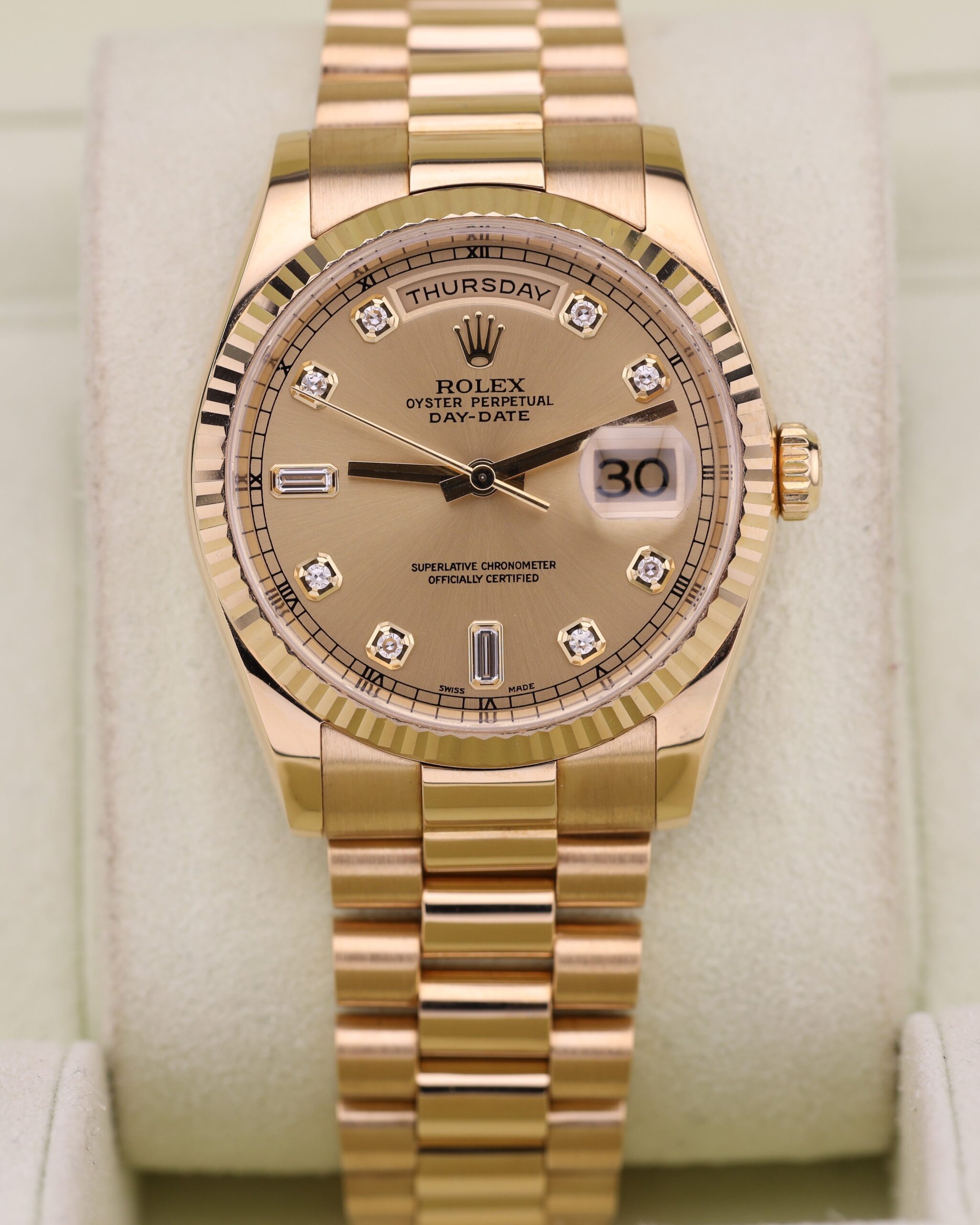 Luxury gold wristwatch with diamond dial