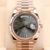 Luxury rose gold watch with olive green dial