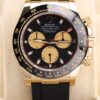Yellow gold chronograph watch with black dial