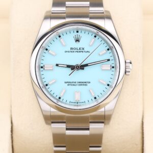 Luxury turquoise blue wristwatch with factory stickers