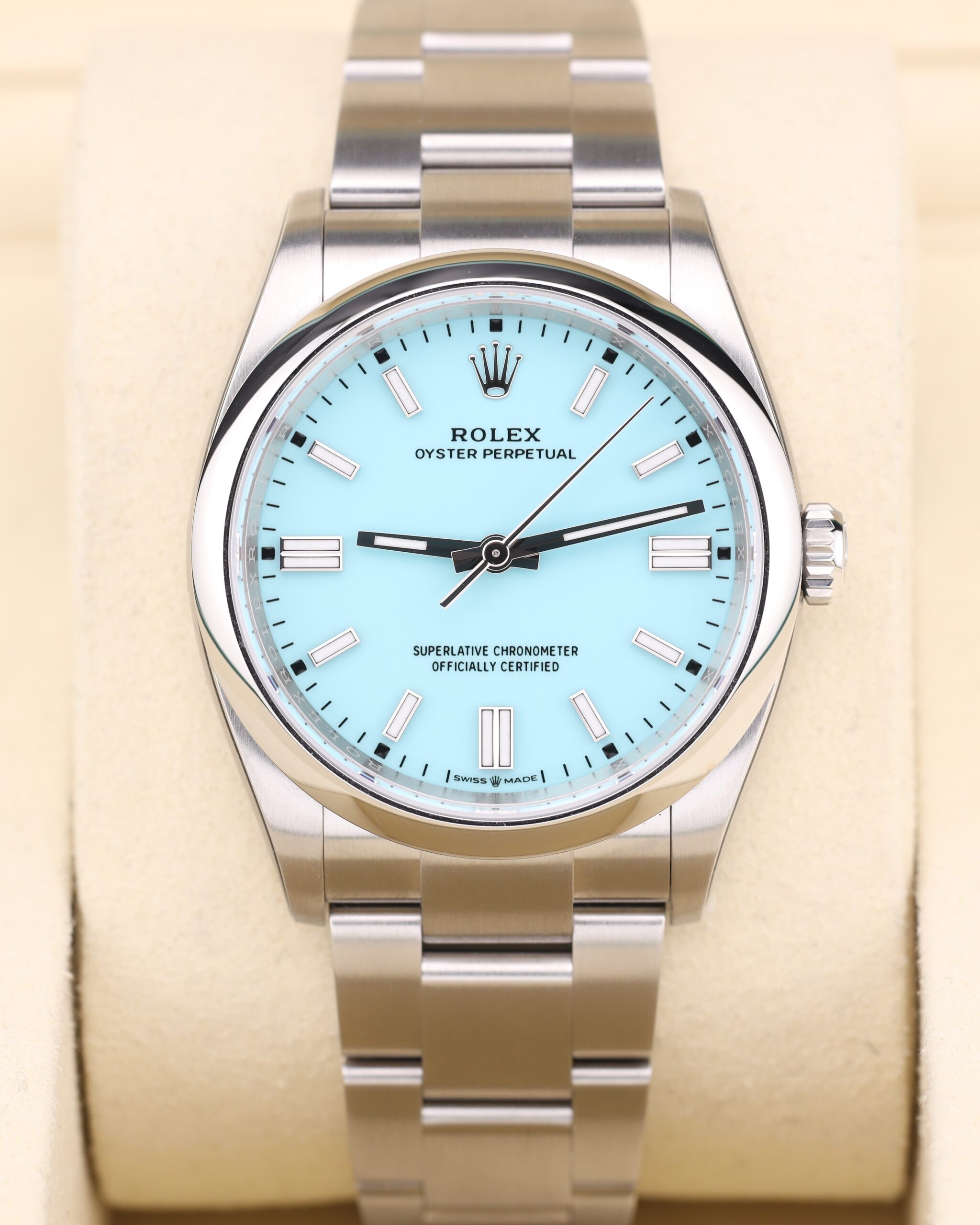 Luxury turquoise blue wristwatch with factory stickers